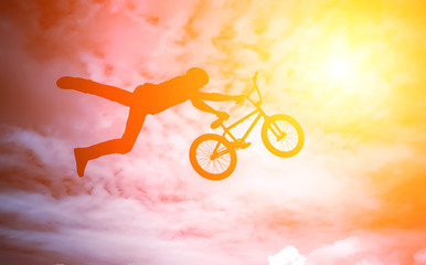 Man doing an jump with a bmx bike.