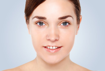 Obraz premium Portrait of Beautiful Young Woman posing in studio