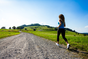 Urban leisure - woman running outdoor