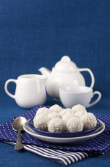 Coconut candies and tea