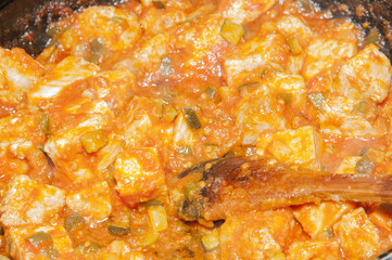 cooking meat with sauce