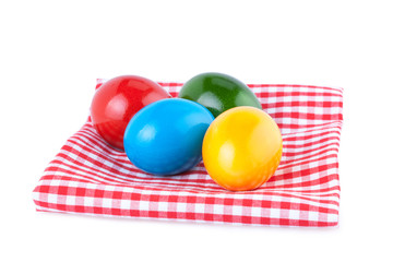 Easter Eggs on a Kitchen Napkin Isolated on White