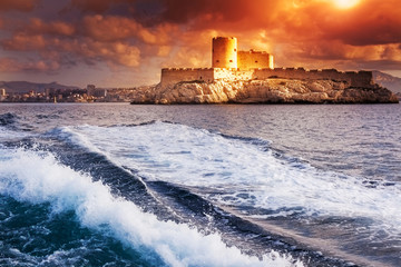 Chateau d'If, Marseille, France, colorful seascape with sunset s