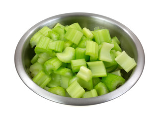 Chopped celery in stainless steel bowl