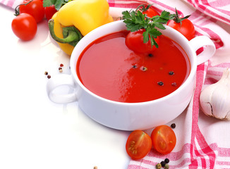 Tasty tomato soup and vegetables, isolated on white