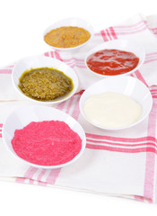 Various sauces on table close-up