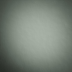 Crumpled handmade paper sheet or plastered wall background