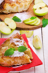Apples pie on red napkin