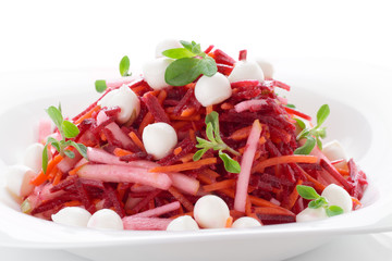 Beetroot and pear salad with mozzarella isolated on white