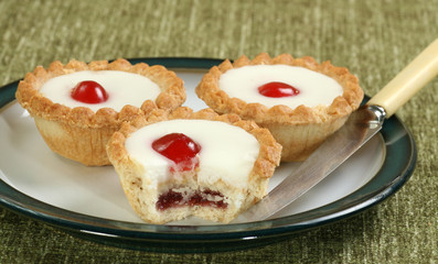 cherry bakewells on a plate