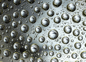 reflection of the watch in Water Drops