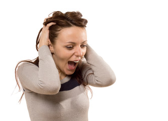 Pretty young woman screaming in excitement