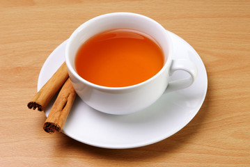 Cup of tea with cinnamon sticks
