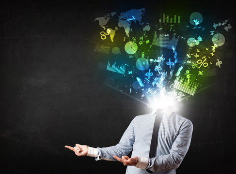 Business man in suit with graph and charts exploding from his bo
