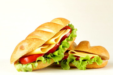 Fototapeta Fresh sandwich with vegetables, green salad and cheese obraz