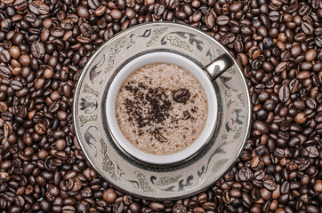 Cup of coffee  and coffee beans