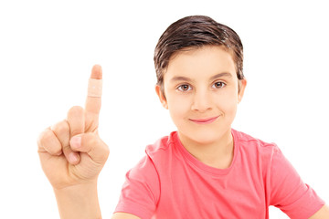 Little kid showing his bandaged finger