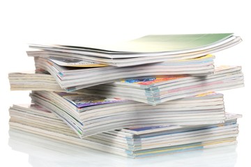 stacks of magazines isolated on white