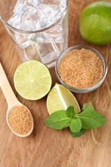 Ingredients for lemonade on wooden table