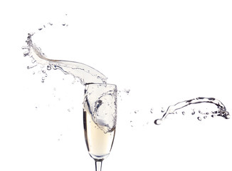 Fototapeta na wymiar Glass of champagne with splash, isolated on white