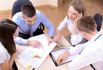 Group of business people having meeting together