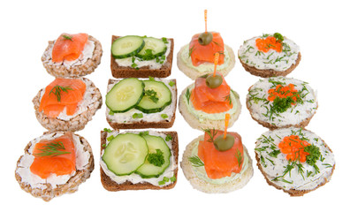 Delicious canapes isolated on white