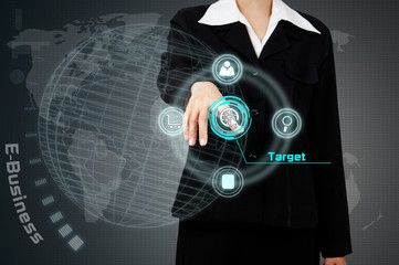 Businessman touching a business target on virtual screen.
