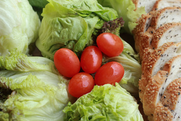 bread sprinkled with sesame -  vegetable green salad