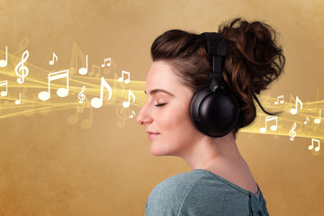 Young woman with headphones listening to music
