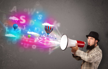 Man shouting into megaphone and abstract text and balloons come