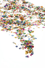 small color numbers confetti on white