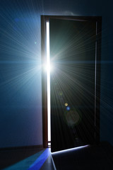 Open door with bright light outside