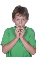 young boy eating easter eggs