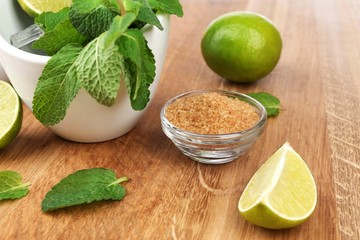 Ingredients for lemonade on wooden table