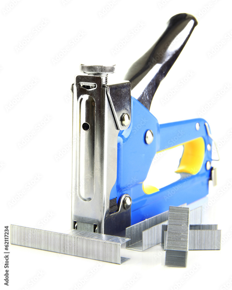 Poster Construction stapler and staples isolated on white