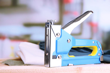 Construction stapler with fabric