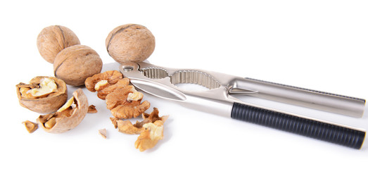 Nutcracker with walnuts isolated on white