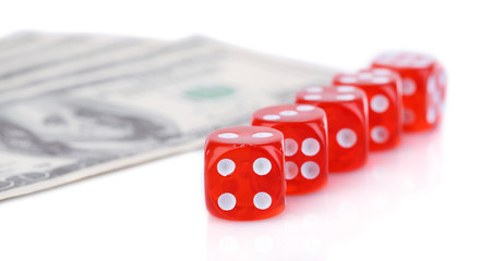 Red dices and money, isolated on white