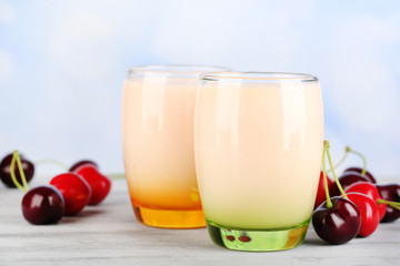 Delicious yogurt with fruits tastes in glasses and fresh fruits