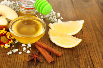 Sweet honey on wooden table