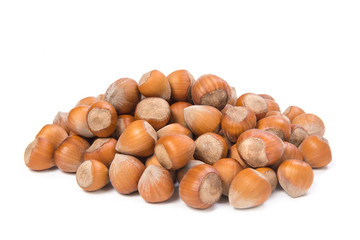 Hazelnut pile isolated on white background