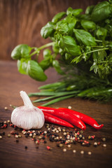 Hot spices on dark wood