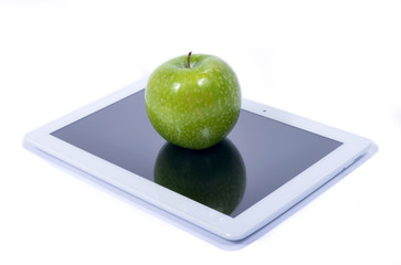 Green apple and tablet