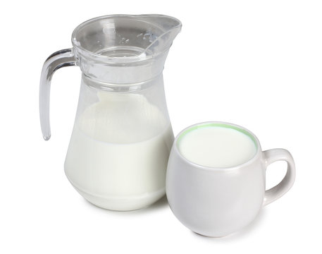 Jug and cup with milk