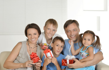 Happy family with gifts