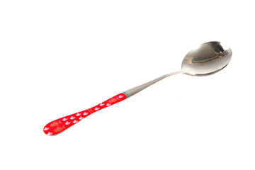 Stainless steel spoon with red pattern.