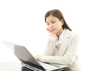 疲れた表情のOL