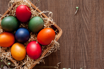 Colored eggs for Easter in a bowl