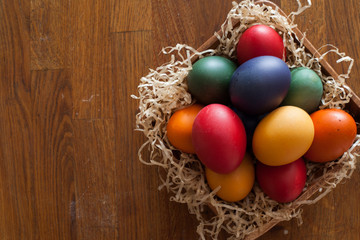 Colored eggs for Easter in a bowl