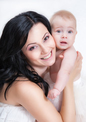 picture of happy mother with baby over white